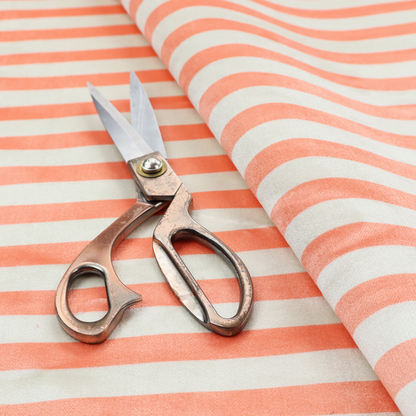 Horizontal coral and white striped fabric pattern.