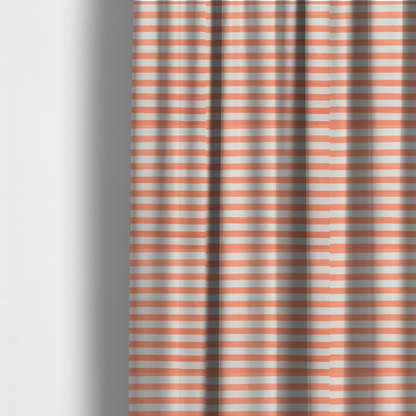 The fabric used to create these made-to-measure curtains is a horizontal coral and white striped fabric pattern.