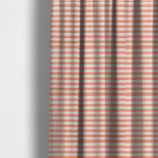 The fabric used to create these made-to-measure curtains is a horizontal coral and white striped fabric pattern.