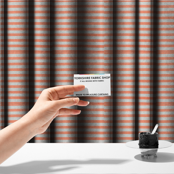 The fabric used to create these made-to-measure curtains is a horizontal coral and white striped fabric pattern.