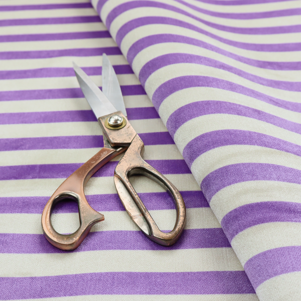 Horizontal purple and white striped fabric pattern.