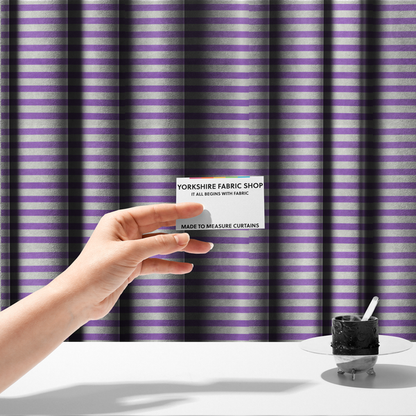 The fabric used to create these made-to-measure curtains is a horizontal purple and white striped fabric pattern.