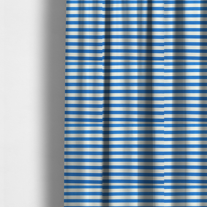 The fabric used to create these made-to-measure curtains is a horizontal blue and white striped fabric pattern.