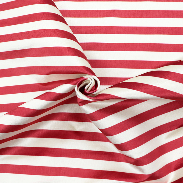 Horizontal red and white striped fabric pattern.