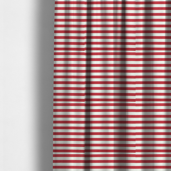 The fabric used to create these made-to-measure curtains is a horizontal red and white striped fabric pattern.