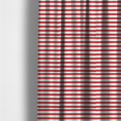 The fabric used to create these made-to-measure curtains is a horizontal red and white striped fabric pattern.