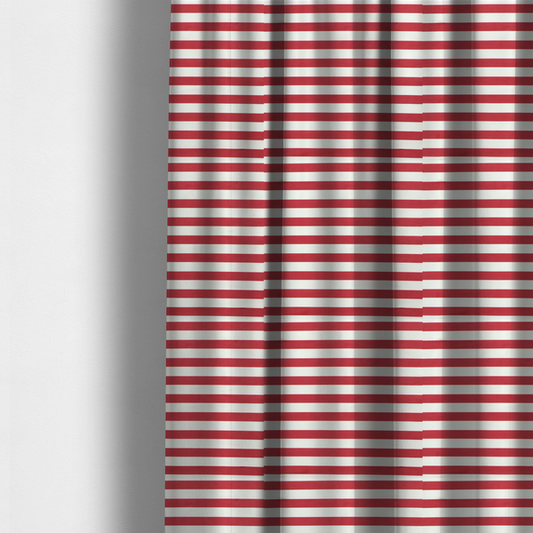 The fabric used to create these made-to-measure curtains is a horizontal red and white striped fabric pattern.
