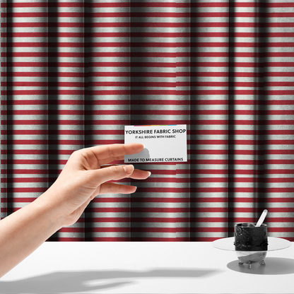 The fabric used to create these made-to-measure curtains is a horizontal red and white striped fabric pattern.