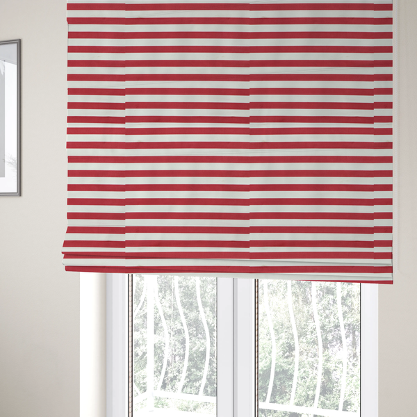 The fabric used to create these Roman blinds is a horizontal red and white striped fabric pattern.