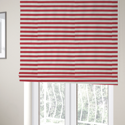 The fabric used to create these Roman blinds is a horizontal red and white striped fabric pattern.