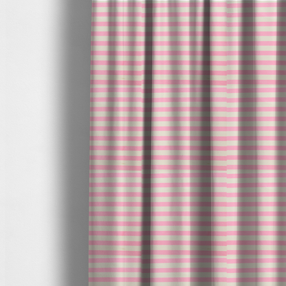 The fabric used to create these made-to-measure curtains is a horizontal pink and white striped fabric pattern.