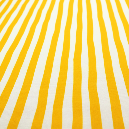 A white fabric patterned with vertical, hand-drawn yellow stripes that feature a slight, organic waviness.   
