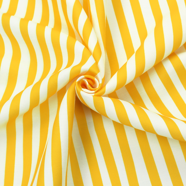 A white fabric patterned with vertical, hand-drawn yellow stripes that feature a slight, organic waviness.   
