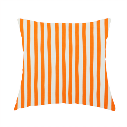 The fabric used to create this handmade cushion is a white fabric patterned with vertical, hand-drawn orange stripes that feature a slight, organic waviness.