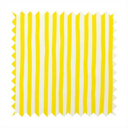 A white fabric patterned with vertical, hand-drawn yellow stripes that feature a slight, organic waviness.