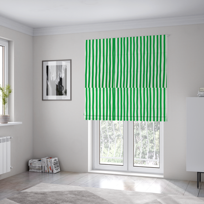 The fabric used to create these Roman blinds is a white fabric patterned with vertical, hand-drawn green stripes that feature a slight, organic waviness.