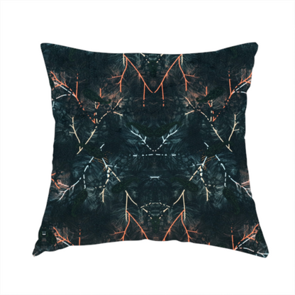 The fabric used to create this handmade cushions features an abstract, wolf-like motif, made up of orange and white lines on a dark, forest inspired fabric.