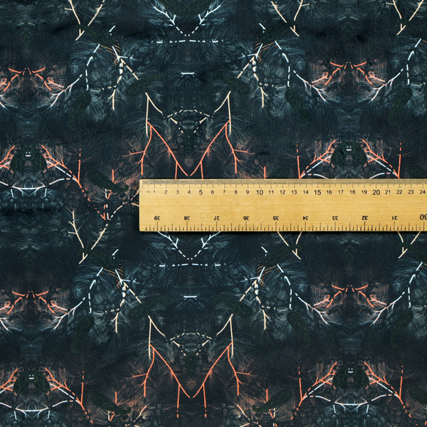 This fabric features an abstract, wolf-like motif, made up of orange and white lines on a dark, forest inspired fabric.