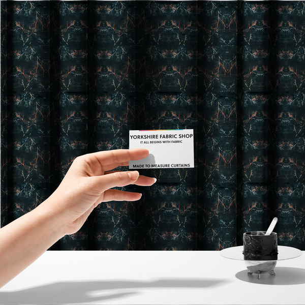 The fabric used to create these made-to-measure curtains is an abstract, wolf-like motif, made up of orange and white lines on a dark, forest inspired fabric.