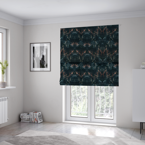 The fabric used to create these Roman blinds is an abstract, wolf-like motif, made up of orange and white lines on a dark, forest inspired fabric.