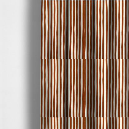 The fabric used to create these made-to-measure curtains is a white fabric patterned with vertical, hand-drawn brown stripes that feature a slight, organic waviness.