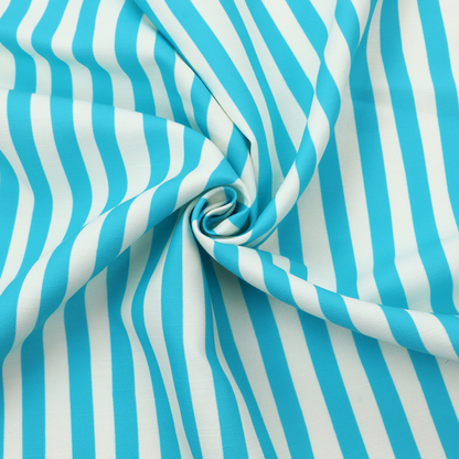 A white fabric patterned with vertical, hand-drawn light blue stripes that feature a slight, organic waviness.