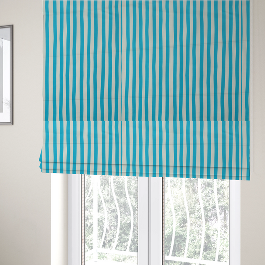 The fabric used to create these Roman blinds is a white fabric patterned with vertical, hand-drawn light blue stripes that feature a slight, organic waviness.