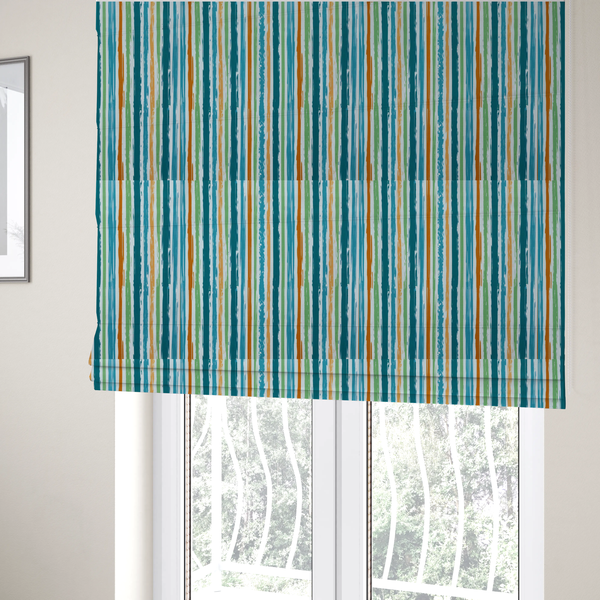 The fabric used to create these Roman blinds is a white fabric patterned with multi-coloured vertical, hand-drawn stripes in teal, green, blue, and orange with a slight, organic waviness.
