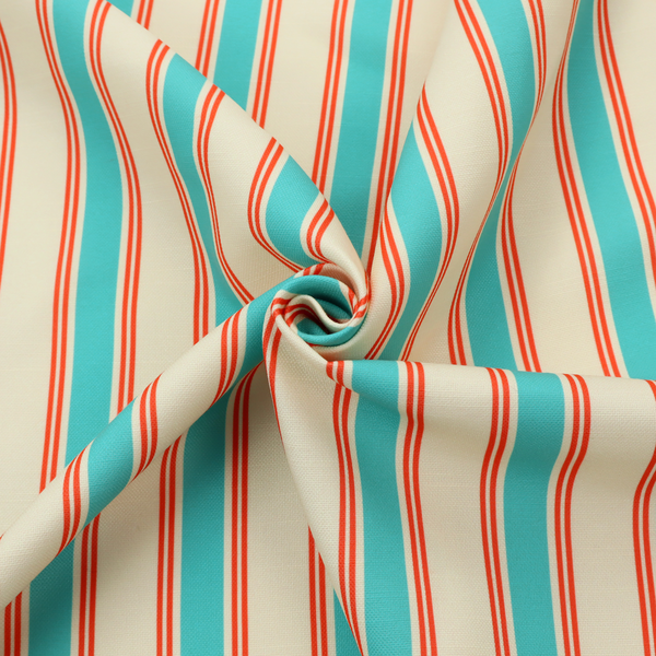 A white fabric patterned with vertical, hand-drawn turquoise and red double stripes that feature a slight, organic waviness.