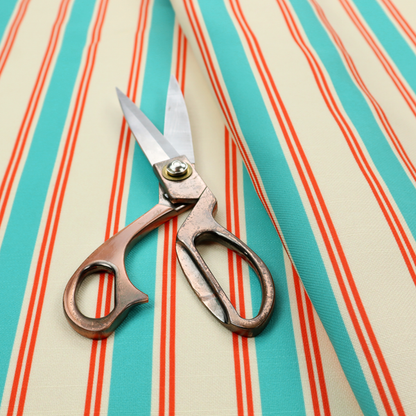A white fabric patterned with vertical, hand-drawn turquoise and red double stripes that feature a slight, organic waviness.