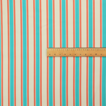 A white fabric patterned with vertical, hand-drawn turquoise and red double stripes that feature a slight, organic waviness.