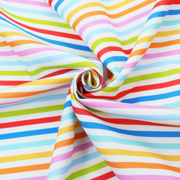A white fabric patterned with horizontal, hand-drawn multi-coloured stripes in pink, blue, green, red, yellow, and orange that feature a slight, organic waviness.   