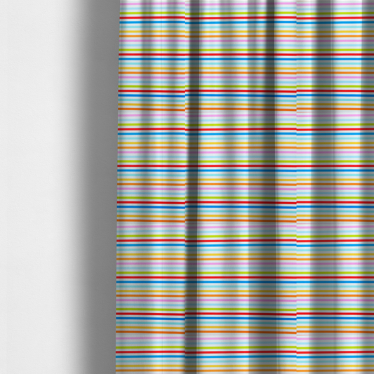 The fabric used to create these made-to-measure curtains is a white fabric patterned with horizontal, hand-drawn multi-coloured stripes in pink, blue, green, red, yellow, and orange that feature a slight, organic waviness.   