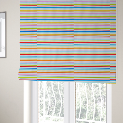 The fabric used to create these Roman blinds is a white fabric patterned with horizontal, hand-drawn multi-coloured stripes in pink, blue, green, red, yellow, and orange that feature a slight, organic waviness.   