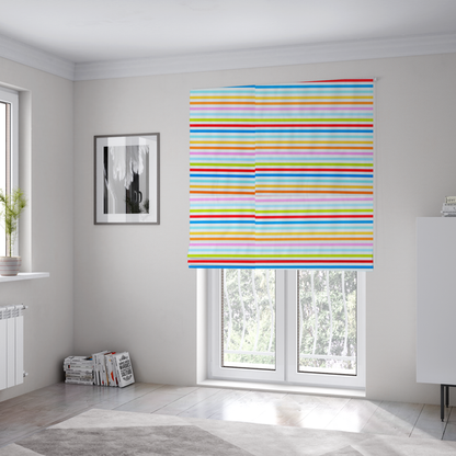 The fabric used to create these Roman blinds is a white fabric patterned with horizontal, hand-drawn multi-coloured stripes in pink, blue, green, red, yellow, and orange that feature a slight, organic waviness.   