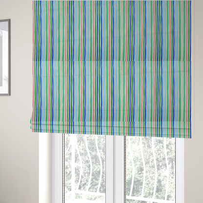 The fabric used to create these Roman blinds is a white fabric patterned with vertical, hand-drawn multi-coloured stripes in green, blue, pink, and light blue alongside dotted lines that feature an organic waviness.