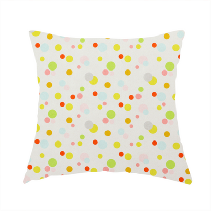 The fabric used to create this handmade cushion is a subtle fabric pattern featuring scattered pastel and bright polka dots in shades of yellow, orange, light green, grey, and soft blue on a white background.