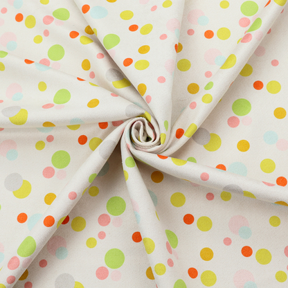 A subtle fabric pattern featuring scattered pastel and bright polka dots in shades of yellow, orange, light green, grey, and soft blue on a white background.