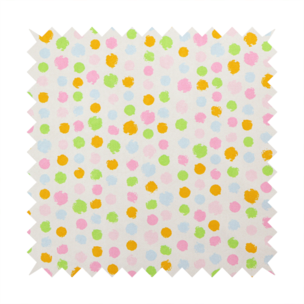A whimsical fabric pattern featuring scattered painterly dots in soft shades of pink, yellow, lime green, and light blue on a white background.