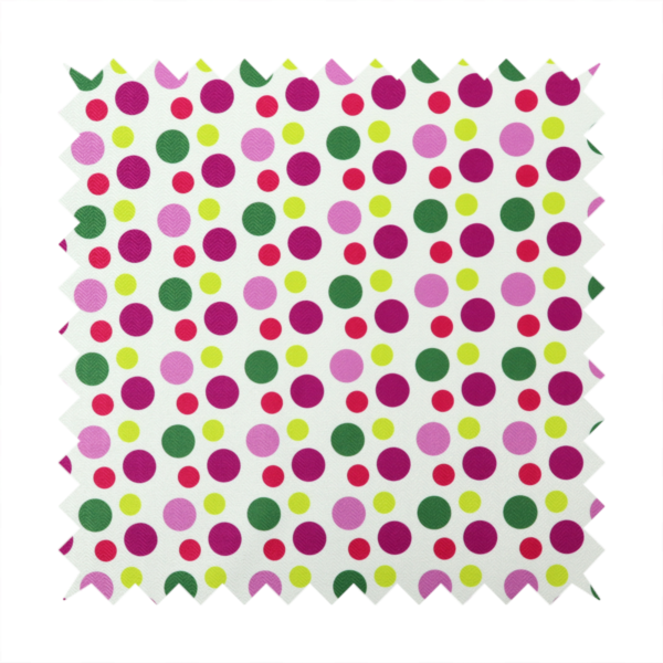 A playful fabric pattern featuring neat vertical rows of alternating polka dots in shades of magenta, pink, green, and lime on a white background.