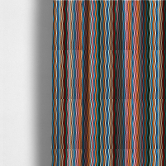 The fabric used to create these made-to-measure curtains is a vibrant fabric pattern featuring tight vertical rows of colourful zigzag lines in shades of orange, pink, blue, red, green, and beige.
