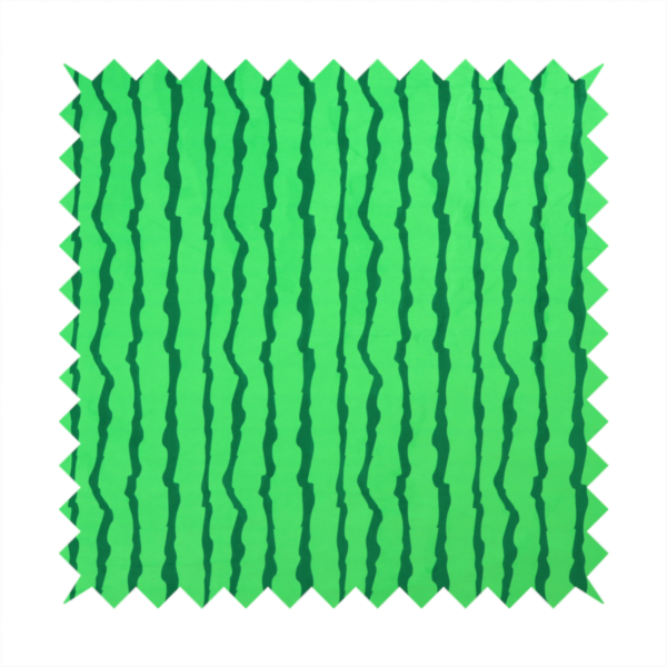 A playful fabric pattern featuring vertical wavy dark green stripes running across a bright green background.