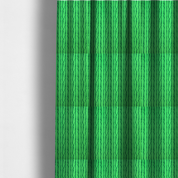 The fabric used to create these made-to-measure curtains is a playful fabric pattern featuring vertical wavy dark green stripes running across a bright green background.