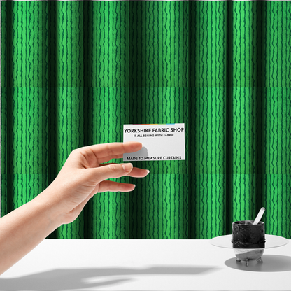 The fabric used to create these made-to-measure curtains is a playful fabric pattern featuring vertical wavy dark green stripes running across a bright green background.