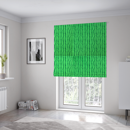 The fabric used to create these Roman blinds is a playful fabric pattern featuring vertical wavy dark green stripes running across a bright green background.