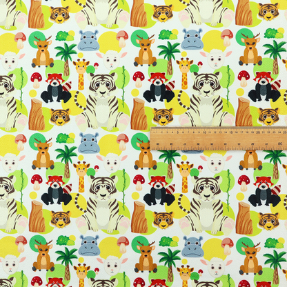 The image features a playful, repeating pattern of various cartoon animals and jungle elements on a light background. The design includes tigers, deer, red pandas, giraffes, hippos, sheep, palm trees, and mushrooms.