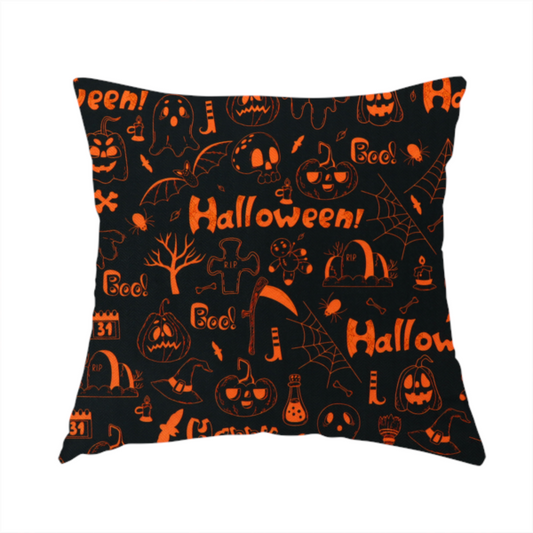 The fabric used to create this handmade cushion features a Halloween-themed repeating pattern set against a black background. The design is filled with spooky orange illustrations, including jack-o'-lanterns, ghosts, skulls, bats, spiderwebs, tombstones, witch hats, and the text "Halloween" and "Boo!"   