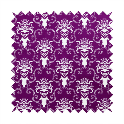 The image features an ornate, repeating damask pattern in white set against a rich purple background.