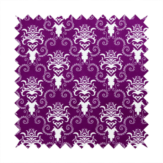 The image features an ornate, repeating damask pattern in white set against a rich purple background.