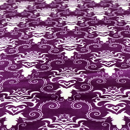 The image features an ornate, repeating damask pattern in white set against a rich purple background.